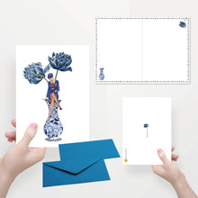 Load image into Gallery viewer, Greeting card folded in half with a lady's envelope on a blue vase