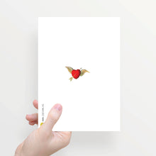 Load image into Gallery viewer, Greeting card folded in half with envelope, lady catches hearts
